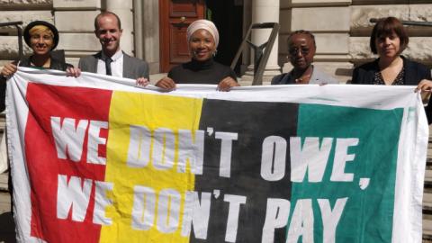 Campaigners from Mozambique together with campaigners from Jubilee Debt Campaign take their message to the UK government